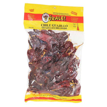 Guajillo chili pods in bag, dark red dried chili pods visible through clear plastic