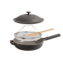 Dark gray Always Pan set with steamer, mesh basket, and wooden-handled skillet