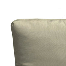 Beige chaise lounge cushion with textured fabric close-up