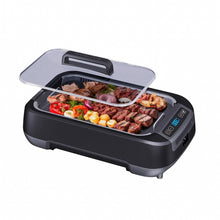 Smokeless griddle grill system with glass lid closed, showing food inside