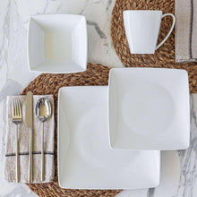 White square dinnerware set with mug, bowls, and square plates