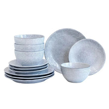 Blue-gray stoneware dinnerware set with ridged rim plates and bowls