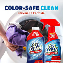 Laundry stain remover refill bottle with red trigger spray and folded purple cloth