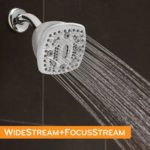 Square fixed shower head spraying water from multiple nozzles on a chrome arm