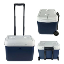 Hard-sided wheeled cooler with dark navy body, white lid, and two caster wheels
