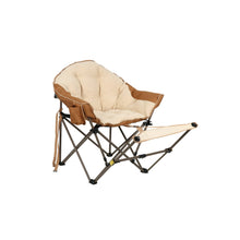 Beige folding club chair with padded seat and adjustable footrest, metal frame