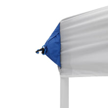 White canopy top edge with blue corner panel and tie loop for attachment