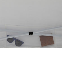 Underside of white canopy top with mesh vent windows and attachment tabs