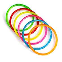 Multi-color sparkly pool dive rings in an overlapping ring bundle