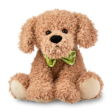 Brown plush puppy toy with green bow tie, big floppy ears, seated