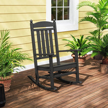 Slate grey rocking chair with tall slatted back and curved rockers