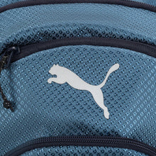 Teal-blue backpack fabric with large white PUMA logo and zipper edge