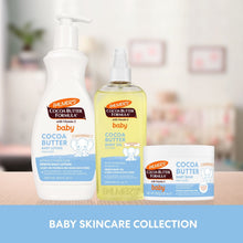 Baby skincare collection featuring Palmer's cocoa butter baby lotion and balm jars
