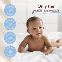 Baby on a bed with skincare approval icons for gentle daily essentials.