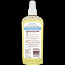 Palmer's Baby cocoa butter oil bottle, back label view, amber liquid, pump.