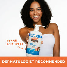 Woman holding Value Size cocoa butter formula body lotion with pump