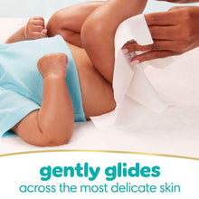 White baby wipes being used on a baby’s skin, Pampers Sensitive fragrance-free