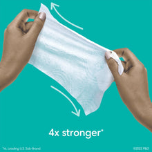 Hands pulling a Pampers baby wipes sheet from a teal dispenser, 4x stronger claim.