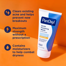 Acne foaming wash squeeze tube next to white foam drop