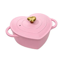Pink heart-shaped Dutch oven with matching lid and gold heart knob
