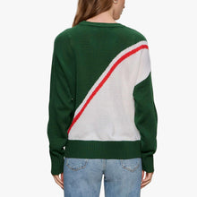 Women's green holiday sweater back view with diagonal stripe and knit hem