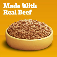 Chopped ground dinner wet dog food in a bowl with real beef crumbles text.