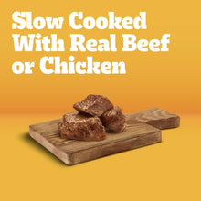 Pedigree wet dog food variety pack box featuring Slow Cooked beef or chicken text and meat