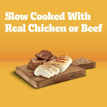 Slow-cooked puppy food with real chicken or beef pieces on a wooden tray