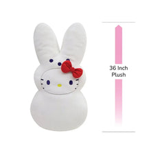 White bunny plush toy with red bow and oval Hello Kitty face