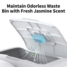 Turquoise scent cartridge inside open white pet waste bin