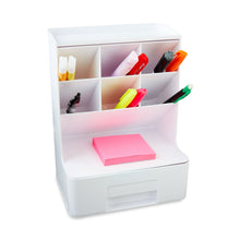 White plastic desktop organizer with front drawer and open compartments holding colorful pens