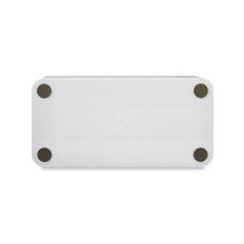 White desktop organizer bottom with four round feet for stability