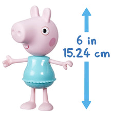 Peppa Pig pig figure in blue dress with 6 in height measurement shown