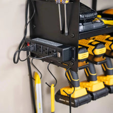 Wall-mounted power tool organizer control panel with outlets and hanging hooks