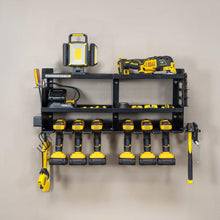 Wall-mounted power tool organizer with black shelves and yellow power drills
