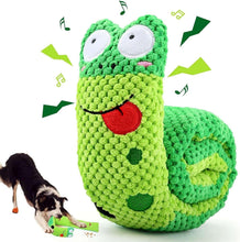 Large green crocheted rolled dog toy with cactus face and red mouth, plush texture.