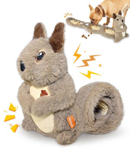 Grey plush squirrel dog toy with treat dispenser pouch and long curled tail