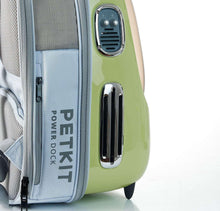 Green cat carrier power dock panel with PETKIT label and side ventilation grille