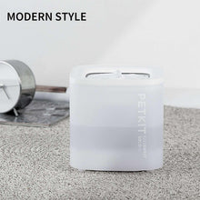 White Petkit smart pet water fountain on a stand with clear water window on top