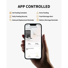 Smart pet food dispenser app control on smartphone showing feeding schedule