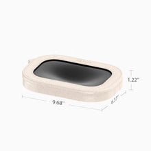 Beige speckled refill ring with dark oval opening; 9.68 x 6.37 x 1.22 in size