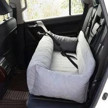 Light gray three-seater pet bed installed in back seat with side walls and straps