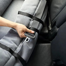 Gray pet bed strap with metal latch and adjustable webbing on car seat