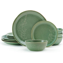 Green stoneware dinnerware set with embossed leaf pattern, includes plates and bowls