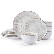 Stoneware dinnerware set with gray floral plates and matching white bowls