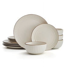 Beige stoneware dinnerware set with round plates and bowls, ridged edge