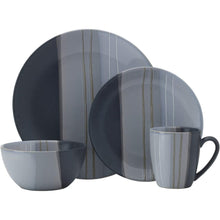 Gray stoneware dinnerware set: plates, bowls, and handled mugs with vertical stripe glaze