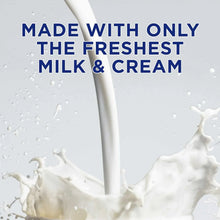 Cream cheese ingredients: milk and cream splash with droplets