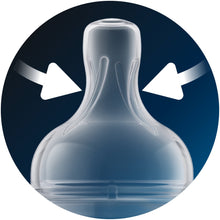 Anti-colic air-flow vent close-up for clear baby bottle, arrows feature