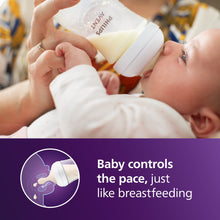 Philips Avent Natural baby bottle with white nipple, used for breastfeeding-style feeding